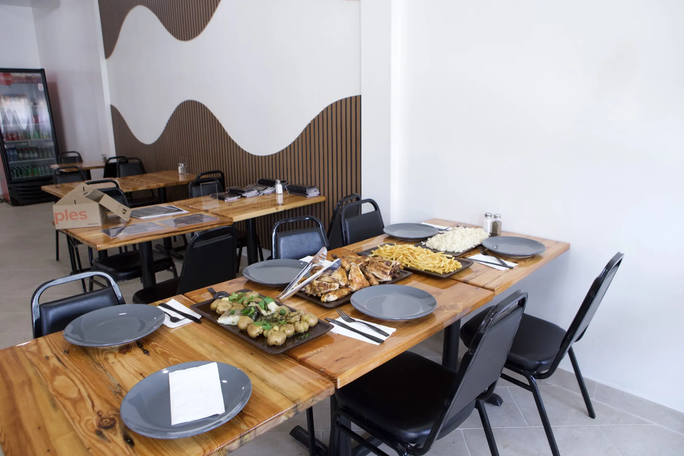 The dining room set for a family-style meal